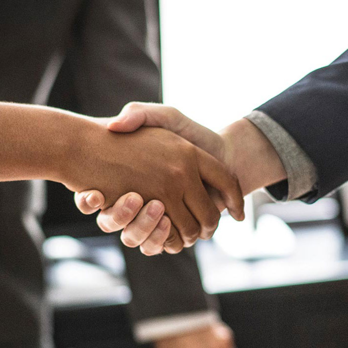 Handshake between two people